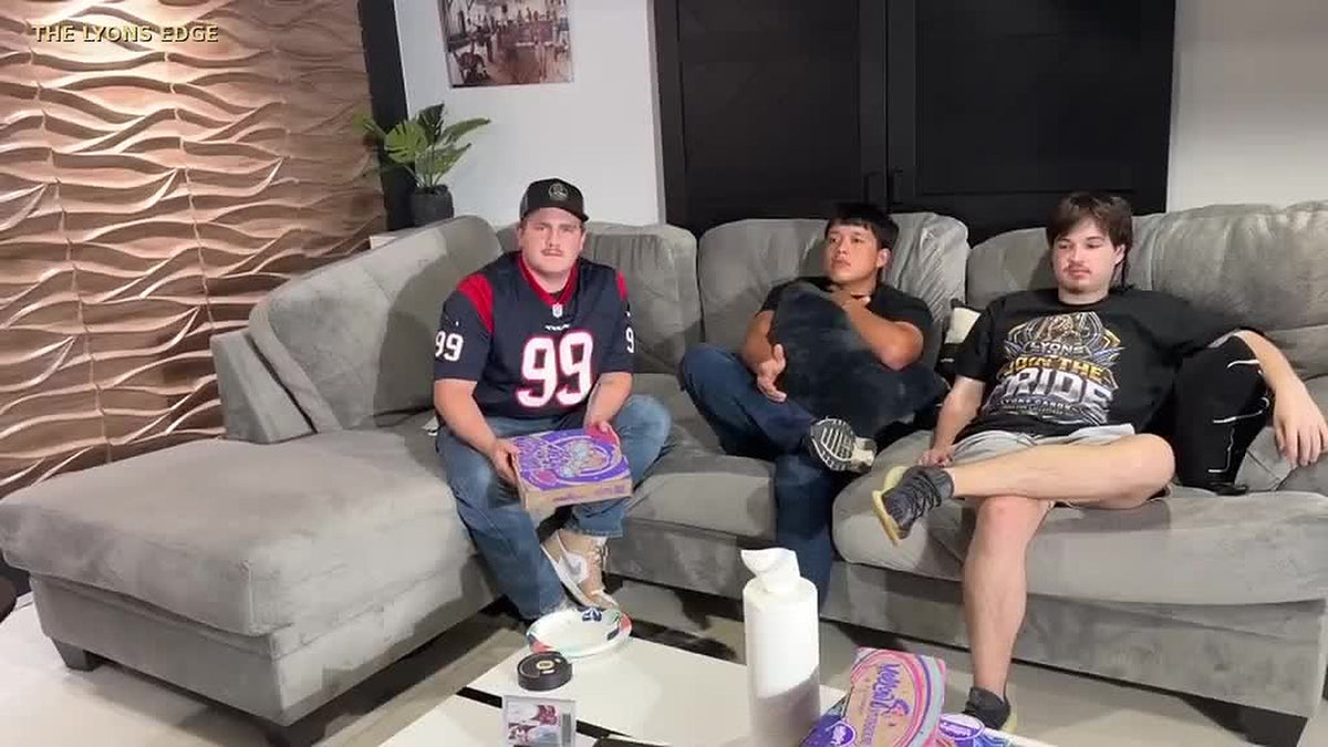 Fig. 2 Tommy and Connor on the couch. First the slice, then the card.