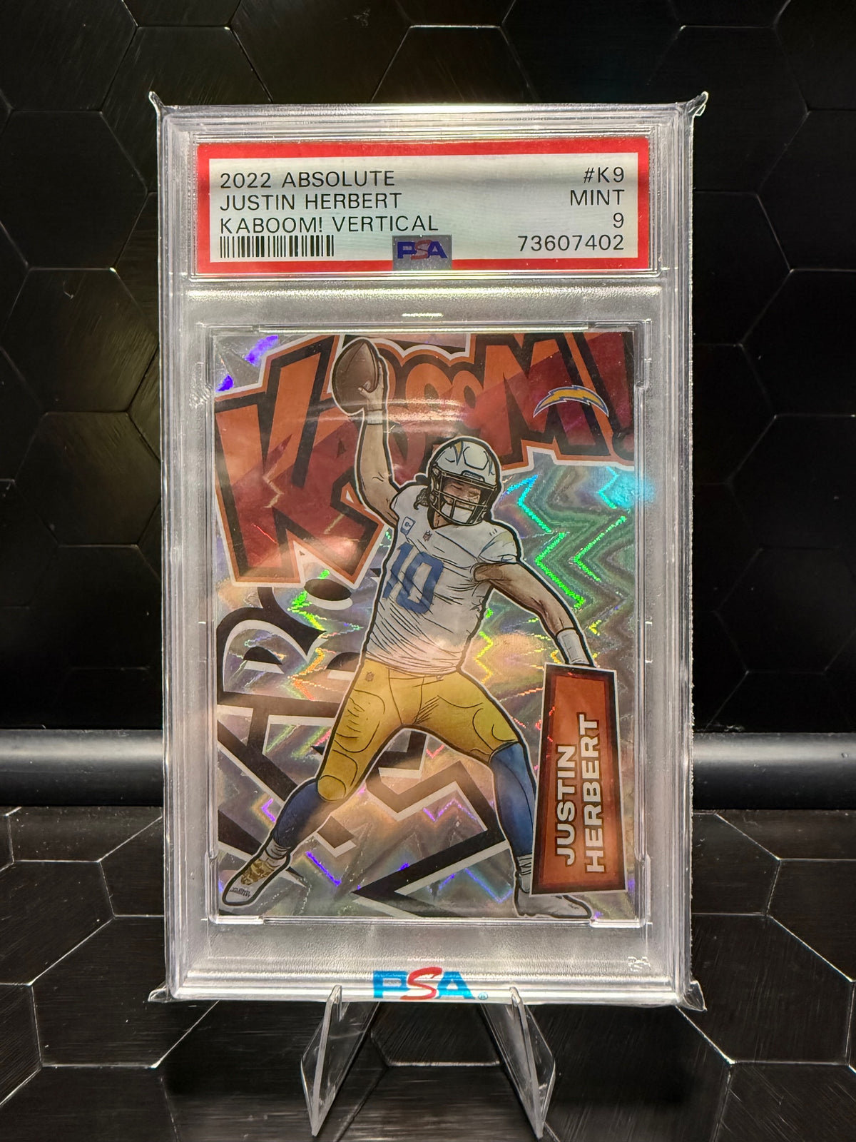 2022 Panini Absolute Justin Herbert Vertical Kaboom SSP PSA 9